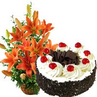 Cakes in Jammu consisting 12 Orange Lily Arrangement 1 Kg Black Forest Cake in Jammu